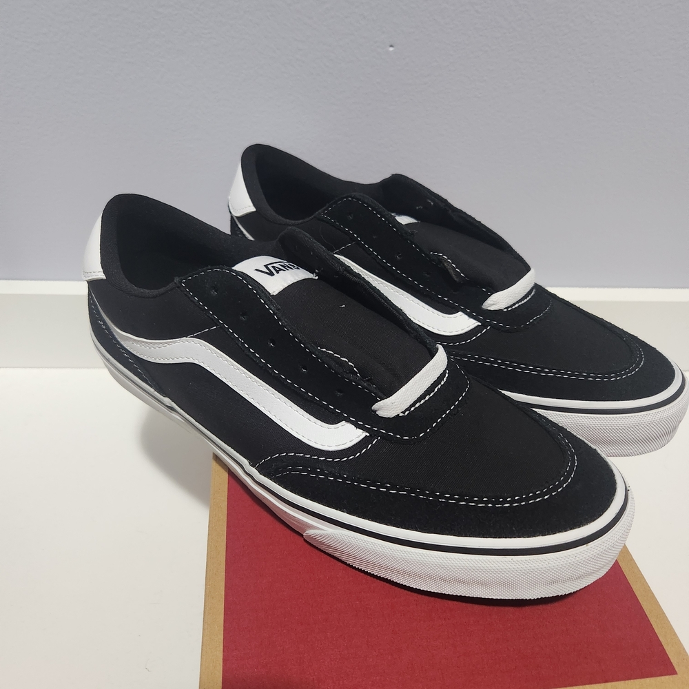 NWT. Vans Men's Black and White Slip-On Sneakers
